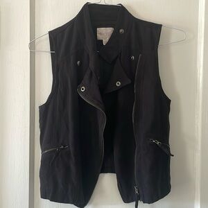 Black faux suede vest from decree. Medium. No visible flaws, zipper pockets.